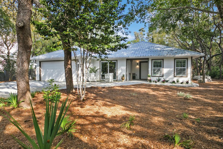 ''Peaceful, easy feeling'' is what you will feel upon turning onto Camp Creek Road South. Located in one of the most sought after 30A east end locations, this beautifully renovated home sits on a large homesite with old growth, hard woods and views of Camp Creek Lake to the west. The home was transformed into an inviting place to live, entertain and enjoy! Recently completed remodel included a remastered kitchen with all new appliances, backsplash to the ceiling,  as well as custom cabinetry. All of the bathrooms have been completely redone with custom tile, cabinetry and excellent finishes. New roof, gutters, surround sound system, and a brand new paver system in the driveway as well as the screened-in back porch. With deeded access to one of Walton County's Coastal Dune Lakes,   you are steps away from the peace and tranquility of one of the community's rarest commodities. Kayak or paddle across Camp Creek Lake to the the emerald waters of the Gulf of Mexico. 
You are but a stones throw away from all your favorite spots along 30A, with all it has to offer. Enjoy dining and shopping along 30A or walk or bike to the Hub for entertainment and a quick dinner.