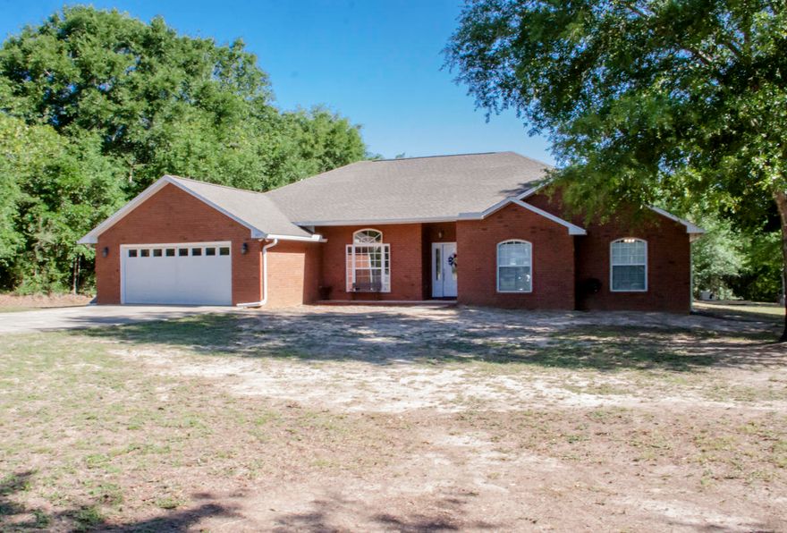 Available 07/01/2019....Crestview custom home with 4/3 floor plan and over 2300 square feet. Located on cul de sac and sitting on over an acre. Fantastic home features formal dining room, electric fireplace, split floor plan with mother in law suite, large laundry, HUGE garage, screened back porch for entertaining, and spacious rooms. Wood flooring, solid surface counter tops, eat in kitchen, large pantry and much more. This is a must see for the money. Wooded privacy, large front yard and back yard. Boats and trailers welcome. Extra long garage for plenty of storage. No inside smoking. Pet welcomed with $400 non-refundable pet fee and owner approval. Don't miss out on this opportunity.