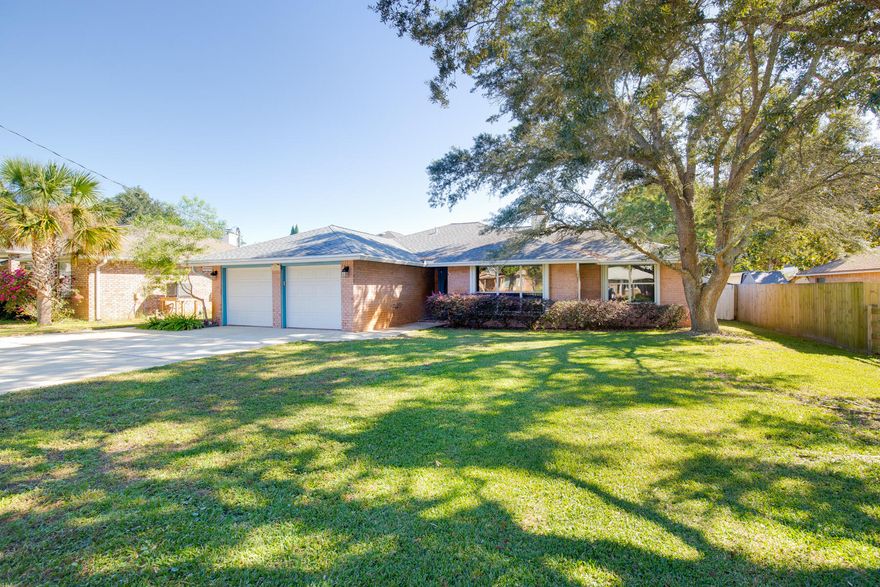 No HOA. South of Hwy 98. Walking distance to your deeded water access! Plenty of room for your boat or paddle board! Boat ramp is only a few hundred yards away. Enjoy the water view from your front yard!! Just a few minutes to the beautiful beaches of Navarre!!  Can also be used as an income producing property with similar homes renting for $2,500 to $3,000 a month.