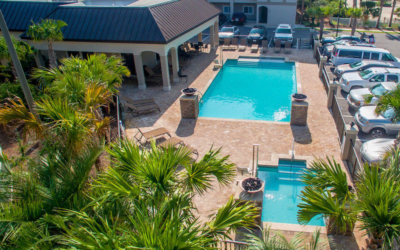 Sought-after Alerio ground floor condo, fully furnished and rental ready. Totally turnkey, and ready for you or your guests! Head to the beach via one of the two deeded beach accesses (1 private), or hop in your golf cart for a short ride to shopping, dining and entertainment on Scenic 98 (a.k.a. Old 98).This 1st floor, 3-bedroom condo offers wood floors throughout with tile in baths; 10-foot ceilings; crown moulding in living area; granite countertops in kitchen & baths; stainless appliances; washer& dryer. An on-site check-in office adds to Alerio's value and security as a vacation rental. Alerio is fenced and gated, with a heated pool, hot tub, splash pad for kids and outdoor grilling area.