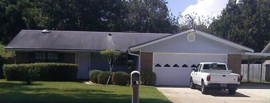 Location, location, location! Convenient to Hurlburt and Eglin! This well-kept 3br/2ba split plan home features a large open living room/dining room/kitchen, with a brick fireplace, huge master suite with large walk in closet, skylights in both baths, a 15x11 screened porch, 2-car garage with attic space, and a 1-car covered carport. Immaculate, no wasted square footage here! Nicely landscaped yard, great neighborhood, you'll be glad you gave this home a visit!