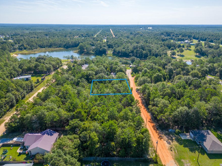 Build your getaway home or place a mobile home with no HOA fees! Vacant wooded lot 0.22 of an acre in size with easy access to main highways. (HWY 90, I-10, 285, and 331). 1/2 mile away from a public park with a lake (Beaver Lake). This property is near many great outdoor activities like fishing, golfing, national parks, and the beautiful beaches of the Emerald Coast! (Close by popular cities: Niceville, Crestview, Destin Florida, 30A / Seaside and Panama City Beach) While there are no utilities currently in place on the lot, power and public water is available in the area, and for sewer services, a septic system would need to be installed.Gps location:https://maps.app.goo.gl/ieqzpubgoBdZzNJ17Claim your piece of Florida land!