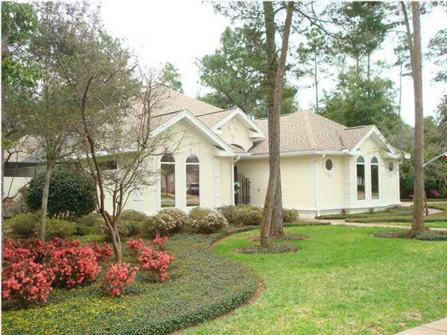 Custom built with DETACHED GUEST HOUSE, private lanai with pool/waterfall and courtyard. Very few homes have a separate guest house for family and friends providing complete privacy for guests. This home located in Swift Creek, has all the bells and whistles and from the moment you enter through the iron gate, you will love this home. With gas lanterns, security system, extra parking with pavers, and tons of storage. The main house features two bedrooms with an open floor plan, deluxe gourmet kitchen. Top of the line stainless appliances including a 5 burner gas cooktop with custom vent hood, large pantry, gorgeous granite and plenty of granite counter space with a built in wine rack. Plenty of cabinets with pull-out shelves. The Master bedroom overlooks courtyard and has 2 large closets. Large master bathroom with two vanity areas, walk in shower and separate garden tub. Lots of storage space throughout the entire home. Every room opens up to the courtyard/pool with high efficiency french doors or sliders. The salt water pool( which was just resurfaced), has a flowing waterfall, and is surrounded with beautiful tile and pavers. So very peaceful sitting out on the Lanai. The additional bedroom is currently used as an office with a maple built desk/organization area in the closet, but this can be removed if needed. Separate guest house has eating area, kitchenette with refrigerator, full bathroom, which also opens onto  the pool area. The 2 car garage offers tons of storage with floored attic space and central vac. This home features two gas water heaters, vessel sinks , custom built cabinetry, 10' ceilings and 9' solid wood doors. The living room gas fireplace has custom brick surround. All windows are top quality double pane with tint to reduce heat and glare. Paver driveway has extra parking.  Pavers continue all the way into the courtyard. For buyers comfort, there is a termite bond in place. Brand new washer and dryer can stay if needed. There is plenty to see in this home, so call today to make an appointment to view this very unique home.