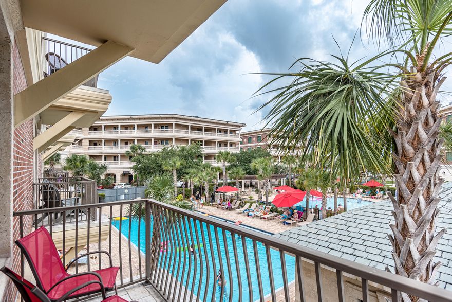 Rarely available! This unit has never been rented. Well maintained & the largest studio unit in Building H. The corner unit allows for tons of natural light and has two balcony spaces. Western balcony overlooking 2 community pools is 11'x4' and the Northern balcony is 10'x3'. There is a 2015 Mitsubishi mini-split system along with added ceiling fans for air flow. Unit features a queen size bed. Extra storage above the water heater. Nice bathroom with sliding glass shower doors. Perfect for an investment, second, or primary property! Enjoy all of the amenities of the Village right outside your door. Building has Wifi, Beach access with Tram Service, Restaurants, Shopping, and Bike Rentals for exploring the rest of 30A. Located within minutes of Alys Beach, Pier Park, and Rosemary Beach.