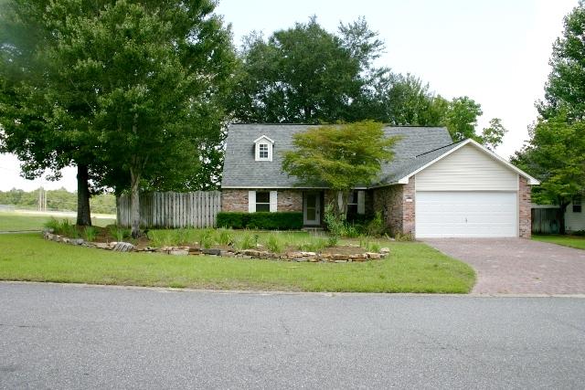 What a charming home! Plenty of character here - both inside and out! The location is great as well! Just a block from shopping, minutes to restaurants and hospitals, an easy trip to the military bases and easy access to the interstate! There's plenty of rooms here as well. The 4th bedroom would also make a nice study or playroom. There's a large loft area on the 2nd floor that would make a great movie room, play room, office or workout room. You decide! The living room features beautiful tile flooring, cozy corner fireplace and opens to the dining and kitchen area. All appliances convey, including the washer and dryer and there are large closets in every room. The master suite has 3 of them! Enjoy the beauty of the backyard from the comfort of your air-conditioned Florida room, or on
