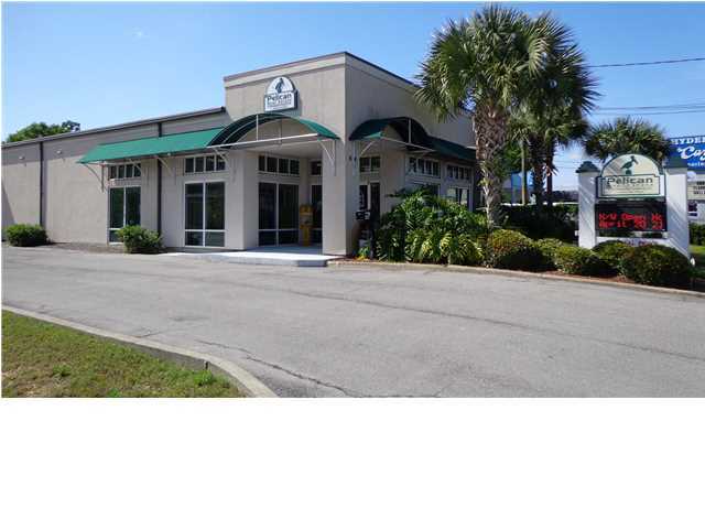 Class A office building in Fort Walton Beach. Great for Doctors office or ant professional business High visibility on Beal Parkway just South of Lowes and Walmart. Features on the inside include: 12 private offices, 2 conference rooms, reception area, break room, his and her bathrooms, file room, and additional large copy/supply room. Building also has 2 large warehouses in the back with private entrance and roll up doors. Current real estate office is relocating to a another space. Buyer to verify square footage and room dimensions.