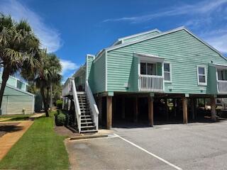 This is the one you've been waiting for! Sea Cabins # 5C features deeded beach access, one of only a few units on stilts for peace of mind from weather, low HOA fees, and an owners closet for all your beach gear. Just across the street is gated access to 100 feet of private beach. There is one loft bedroom, a bunkroom and two full bathrooms. New metal roof in 2023, and new AC in 2020. Close to the beach, shopping, Silver Sands Outlets, and restaurants - with partial Gulf view and community pool, along with reserved parking for the unit in the shade. This unit truly has it all, and is one of the most affordable in Miramar Beach! Buyer to verify all info and dimensions.