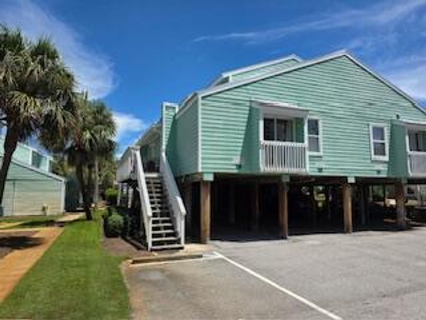 This is the one you've been waiting for! Sea Cabins # 5C features deeded beach access, one of only a few units on stilts for peace of mind from weather, low HOA fees, and an owners closet for all your beach gear. Just across the street is gated access to 100 feet of private beach. There is one loft bedroom, a bunkroom and two full bathrooms. New metal roof in 2023, and new AC in 2020. Close to the beach, shopping, Silver Sands Outlets, and restaurants - with partial Gulf view and community pool, along with reserved parking for the unit in the shade. This unit truly has it all, and is one of the most affordable in Miramar Beach! Buyer to verify all info and dimensions.