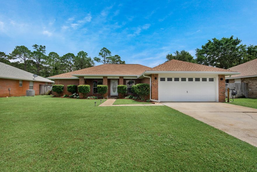 Beautifully Designed Brick Home with open floor plan, split bedrooms and numerous updates over the last few years. Living Room has 11 ft. vaulted ceiling and opens to a lush backyard. The Kitchen with all Samsung Stainless Steel Appliances (replaced in 2016, 2017, 2019) overlooks the Living Room and is connected to both formal and informal dining. The Master Suite is complete with twin walk-in closets, double vanities, jetted, garden tub, and separate shower. French doors open to the large back patio. Updates include: Kitchen Appliances, refinished kitchen and bathroom cabinets, water heater elements, door hardware, privacy fence, New Roof in 2020, refastened to current wind specs, Exterior Lighting, Storm Panels, and the list goes on. An easy walk to the Community Pool and Green.