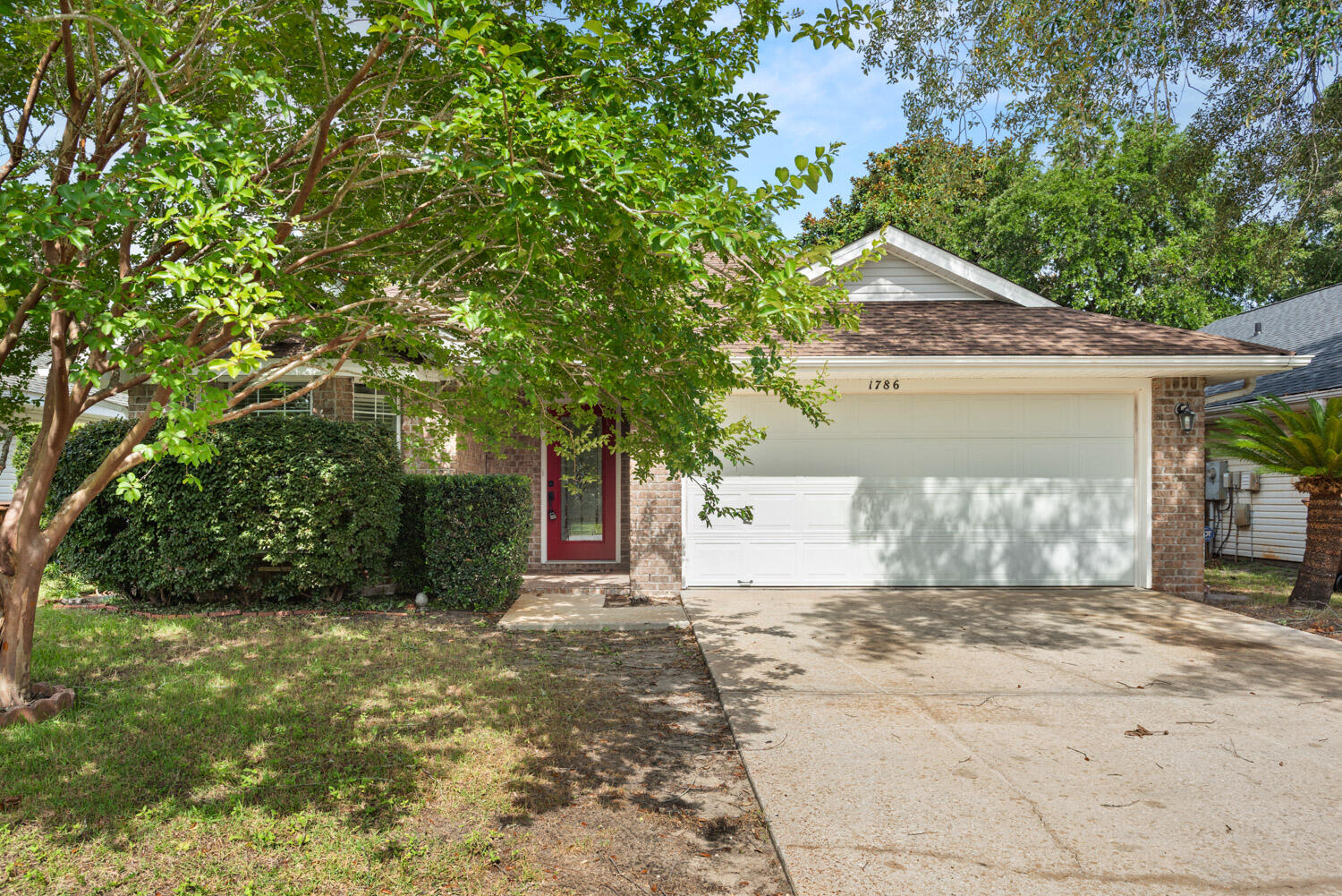 GREAT BUY IN SUPER LOCATION!  This quaint little community is convenient to shopping, restaurants and minutes to the local beaches. This home offers 3 bedrooms, 2 full baths, wood laminate floors in the main living areas, tile in the wet areas.  Freshly painted throughout! The Kitchen has granite countertops and stainless appliances.  The Refrigerator, Washer and Dryer convey with the home as well as Metal Hurricane shutters for all the windows.  The Roof was replaced in 2020 and the HVAC system was replaced in 2021! This home is move in ready and priced to sell.  Contact your agent today to schedule a private showing!  Accepting OFFERS till Friday June 17th @ Noon.