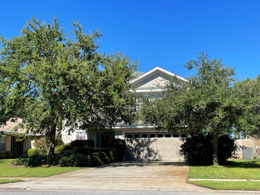 This exceptional home in Santa Rosa Beach's Driftwood Estates is absolutely impressive. Great curb appeal when you approach the home and see the manicured and mature landscaping. Note the roof is brand new as of September 2021. When you walk through the front door of this beautiful home you'll be pleased entering a small foyer and into the living area with cathedral ceilings and fireplace. The spacious kitchen is to the right and boasts freshly painted cabinets, a huge breakfast bar, and stainless steel appliances. There's a large separate pantry and laundry room which opens to garage. French doors open from the dining area onto the patio with pleasing views of the fenced back yard's mature landscaping. There's also a spacious bedroom on the first floor, currently used as an office that's perfectly suited to those who work from home, as well as a full bathroom. The 2nd floor has 3 bedrooms and 2 full baths. The huge master has been freshly painted and the ensuite bath has a large walk-in closet. This lovely home has neutral carpets (just recently professionally cleaned) and tile flooring in the wet areas. The secondary bedrooms upstairs have also been freshly painted. Driftwood Estates is a gorgeous community on Choctawhatchee Bay that offers a swimming pool & clubhouse, a county park with a playground and waterfront picnic area and gazebo, fishing, and basketball & tennis courts.