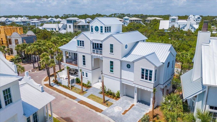 Construction is now complete on this remarkable new home in the non-rental, Gulf-front community of Heritage Dunes South, located off Eastern Lake Road in the heart of Seagrove Beach.Built by Coastal Custom Builders and designed with curated finishes by CCArt & Design Co., this 5,396-square-foot residence offers 5 bedrooms, 5 full bathrooms, and 2 half baths, blending timeless coastal design with high-end craftsmanship.The open-concept layout features generous living and dining areas, a gourmet kitchen outfitted with premium appliances and custom details, and an elevator for effortless access across all levels. A four-story tower captures sweeping Gulf views, creating a one-of-a-kind vantage point for sunrise and sunset. Enjoy a seamless indoor-outdoor lifestyle with multiple balconies, an outdoor kitchen, and thoughtful exterior living spaces designed to make the most of the coastal setting. A two-car garage adds convenience, while quality finishes throughout elevate the home's overall feel.

Heritage Dunes South is a non-rental, gated community featuring a deeded private beach and a community pool, just steps from your front door. 

This home is now ready for move-inbringing together location, design, and lifestyle in one incredible Seagrove Beach opportunity.
