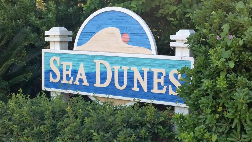 Located in the beautiful neighborhood of Sea Dunes, white picket fences and unique treliss',nestled off of Hwy 30A, just a couple minute walk to the beach or a quick ride in the golf cart. Located on the highest lot in Sea Dunes, corner lot. There are no time limits on build out. Short term rentals are not allowed. Very desirable neighborhood. Close to beach, bay, golf, tennis, shopping, and nature trails. Not many lots this high of an elevation and this close to the beach remain at this price!