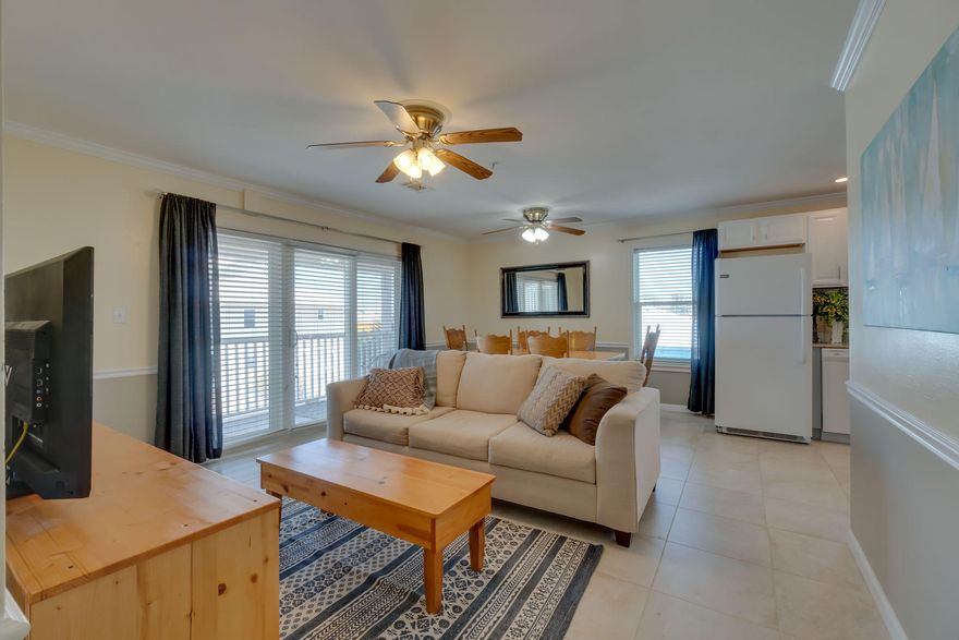 LOOKING FOR LOCATION with DEEDED BEACH ACCESS THAT'S AFFORDABLE...then check out this updated 3 bedroom 2 bath condo perfectly located South of Hwy 98 in the heart of Destin and directly adjacent to Big Kahuna's water & adventure park as well as central to all of the great activities Destin and the Emerald Coast offers. This unit has an open concept floorplan with great balcony space. This split floor plan features a master bedroom complete with walk-in closet and access to the balcony and 2 generous sized guest bedrooms that share a bath. This unit is also one of the few in the complex that has been converted and equipped with a stacked washer/dryer for added convenience. Other upgrades include, but not limited to, newly installed JELD-WEN Premium Atlantic Vinyl impact windows and