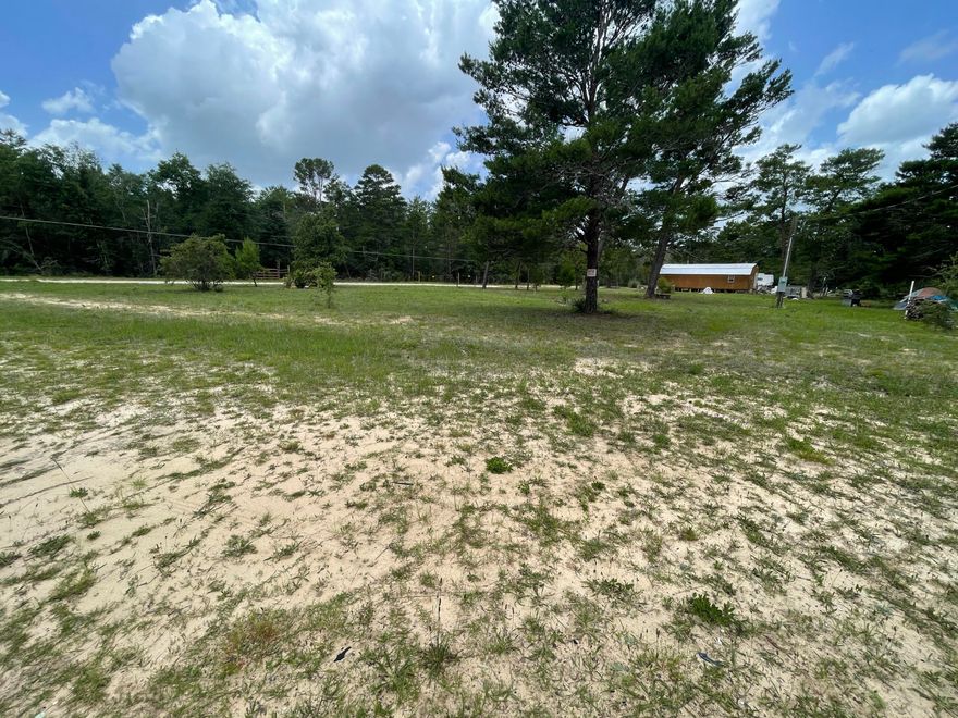 Looking for the perfect spot to build on? Well here it is! This is a double lot and almost 1/2 acre in size. Cleared with well, septic & power on the property! This property is a easy commute to DeFuniak Springs, Crestview or the beautiful beaches of South Walton!