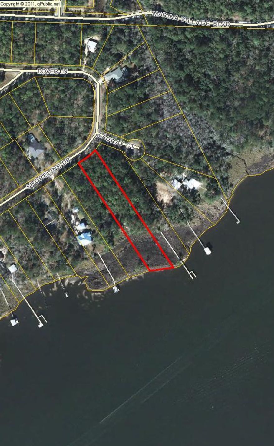 Waterfront lot in Lagrange Shores with 100' on the water. Lot sits near a cup-de-sac and has plenty of space to build. Lagrange Bayou goes out to Choctawhatchee Bay and out to the Gulf of Mexico. Location is close to the beaches of South Walton, Bluewater Bay and Destin.