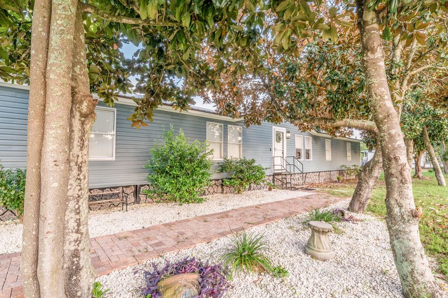 Beautifully updated 4bed, 2bath corner lot home just 1 mile from Lake Powell(which has its own boat launch) and just moments from Pier Park and the best of Panama City Beach living! For the investor, no HOA and short term renters allowed. The chef's kitchen features stainless steel appliances, updated cabinetry, granite countertops, pot filler, island w prep sink, double oven, range hood, and built-in drawer microwave. Throughout the home you'll find LVP flooring, updated hardware including rainfall shower heads, and a new double vanity and shower insert in the master bath. Unwind in the spacious living room or the bright sunroom, and perhaps even enjoy the wood-burning fireplace in the dining area. From there, step out onto a raised deck leading to a brick-paved patio. The backyard(SEE+) includes a 7x7 garden shed, and a 10x20 storage shed with 72" double doors located along Lakeview Dr. Some upgrades include a new hot water heater(2022), and HVAC unit(2021). Comfort, style, and location all in one!
Buyer(s) are responsible to personally verify all details for property and dimensions. Any information contained in this listing is believed to be accurate but is not guaranteed.