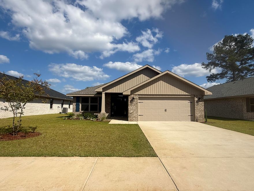 This home features 4 sided brick with maintenance free vinyl trim. The garage has an automatic electric opener with a sturdy raised panel steel garage door. The exterior is completely sodded, professionally landscaped and has irrigation on an auto timed system. The front entrance leads through a foyer with the formal dining room   on the left. as you enter you see the kitchen with its stainless appliances, granite countertops and hand crafted wooden cabinetry with hidden hinges and crown molding on the uppers. There is a breakfast bar for those quick meals and the floorplan is open to the family room.The master bedroom has its own en suite and walk in closet. Floors throughout except bedrooms are adorned with durable LVP. The family room leads out to a spacious patio. Its waiting for you!