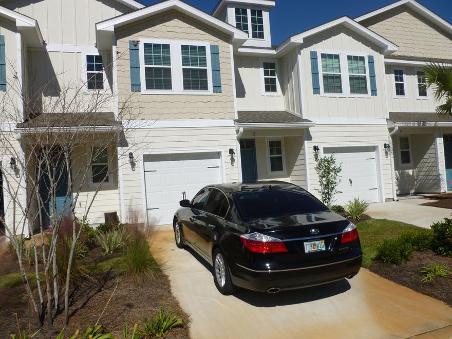 This stunning three-bedroom, two and one-half bath townhome with a one-car garage in a great Santa Rosa Beach location is only one minute to Highway 98 and five minutes to the beach! Light and bright white kitchen with granite countertops and stainless appliances. Tile flooring throughout downstairs and wet areas. Large living/dining area, kitchen and half bath on first floor. Patio off living/dining area. Three carpeted bedrooms, two full baths and laundry closet on second floor. Washer and dryer convey with the sale! The master bath features dual sinks and a beautiful tiled shower. There are two closets in the upstairs hallway in addition to spacious bedroom closets. Crown molding graces multiple rooms! Buyer to verify all dimensions. This beautiful unit should not be missed.  Listing Broker/Licensee related to owner.