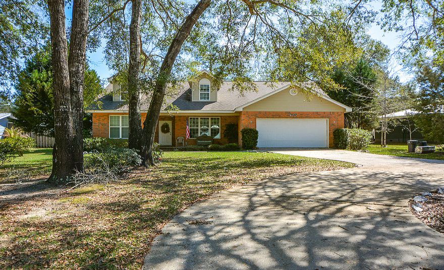 NEW PRICE! WELL MAINTAINED, BRICK HOME without the hassle of a nagging HOA! Brand new HVAC system! Open floor-plan w/split bedrooms. Crown moulding, nice woodwork on baseboards & cased windows, recessed lights, higher ceilings, porcelain tile flooring & thoughtful details throughout. Kitchen w/breakfast area, custom wood cabinets, refrigerator & tile backsplash. Roomy double garage & circle drive. Full staircase in garage leads to second floor - currently unfinished, has a separate entrance & being used as a storage space. This area can easily be finished to become an extra bedroom & bath, office, workout area or more! So much potential here! Custom ext. brick quoins. Close to Black Creek & boat launch at Black Crk Bridge. Easy drive to the Beach & South Walton. Must see this Custom Home!