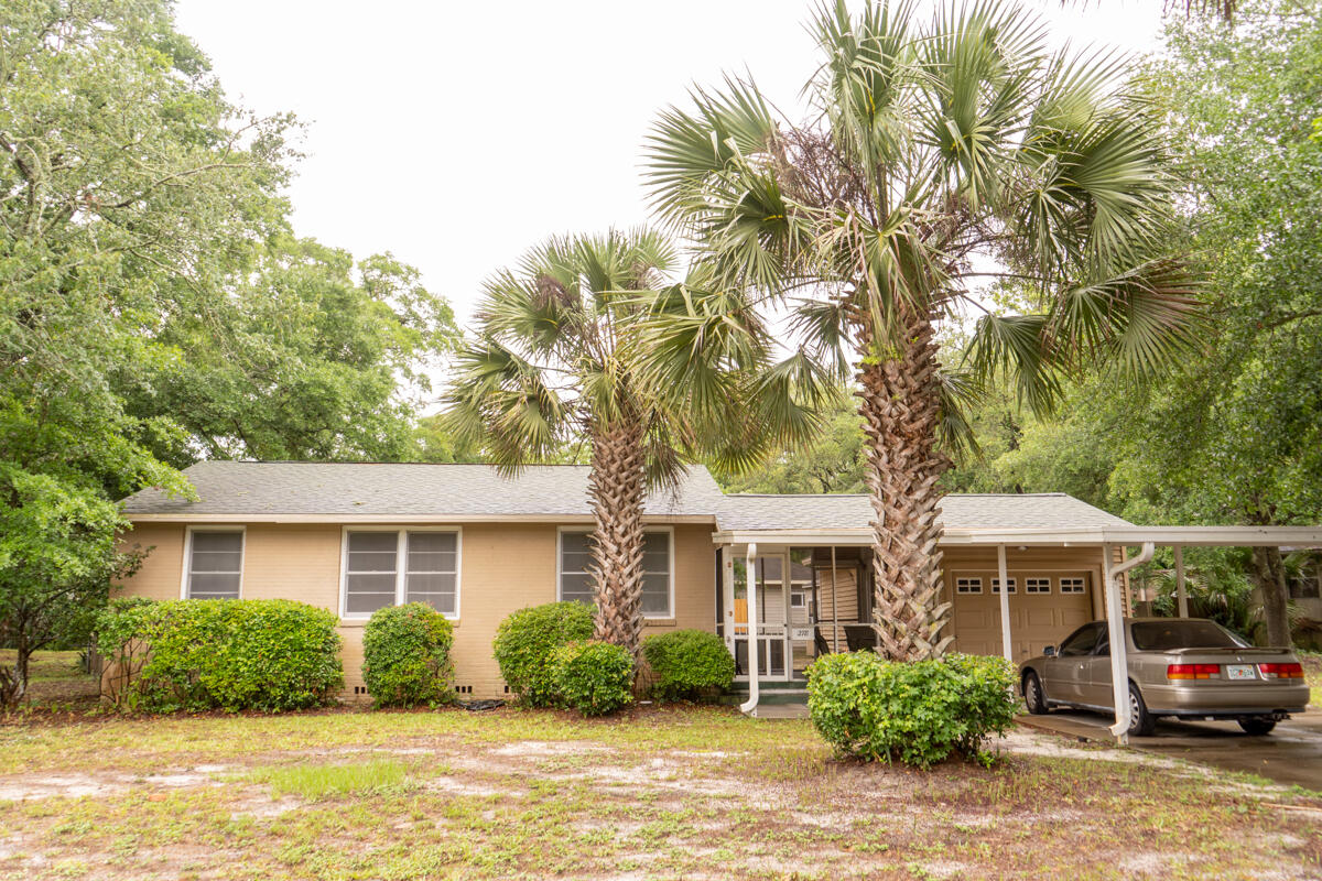 This is a one of a kind property! Just down the street from a park with a boat launch, this property has a great waterview and two separate dwellings on over 1/4 an acre within minutes of all bases. There is one 3/1 home and a second 1/1 home on this property. architectural plans to increase main house size available.