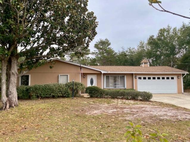 Turnkey, well maintained, vintage modern, smoke free, pet free home in the heart of Destin. Endless opportunities on nearly 1/2 an acre! New Laminate flooring in main areas. Large eat in kitchen with smooth top stove. Vaulted ceiling in spacious family room with additional dining area. Step out onto extensive deck perfect for entertaining. Keep the naturally wooded yard for added privacy, or make it your backyard paradise. Master bedroom has walk in closet, full bathroom, and also exits to the fabulous deck. 2 additional bedrooms with Full guest bath. Oversized 546 sq. ft. garage has painted floor, work bench & cabinets. New roof in 2015. Water Heater in 2017. Close to Beaches, shopping, dining and more. No Homeowner's Association. Welcome HOME sweet HOME!