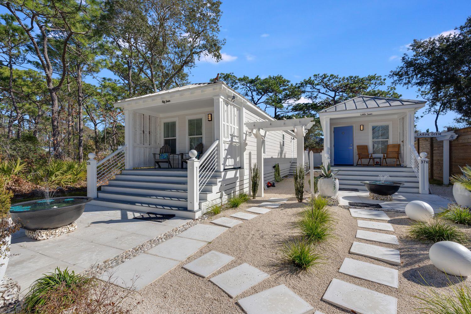 Welcome to the Cottages on San Juan, nestled in the heart of Seagrove Beach and steps from local beach access and the turquoise Gulf waters. This unique property includes a spacious main cottage, Big Juan, and a charming guest retreat, Little Juan--perfect for multi-generational living, rental income, or hosting guests. Big Juan features two bedrooms, one bathroom, and an open-concept design with modern finishes, beach-inspired decor, and a gourmet kitchen. Little Juan offers a cozy living area, well-equipped kitchen, spacious bedroom, and full bath ideal for visitors or as a rental. Located on 30A, enjoy easy access to world-class dining, shopping, and outdoor activities. Whether a primary residence, vacation home, or investment, this property embodies the 30A lifestyle.