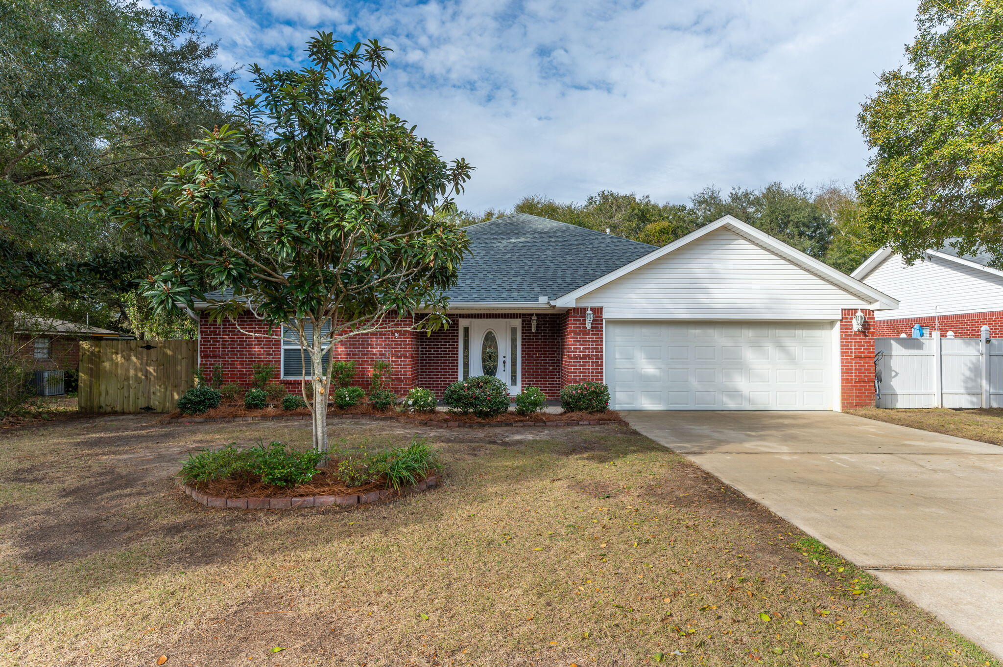 OPEN HOUSE- SATURDAY 01/18 11AM-1PM. Welcome to 405 Evans Rd in the desirable Bluewater Bay community! This freshly painted, spacious 7-bedroom, 4.5-bathroom home with a 2-car garage is designed for multi-generational living, featuring two master suites and five additional bedrooms. The beautifully updated kitchen boasts granite countertops, stainless steel appliances, and a gas oven, while porcelain tile flows seamlessly through the common areas, and new laminate floors add a modern touch to the bedrooms. Significant updates within the past 5 years include a new roof, A/C units, water heater, front and rear gutters, sprinkler system, and fencing. The private backyard is perfect for relaxing or entertaining, featuring a spacious patio and plenty of room for pets to play in the fenced yard