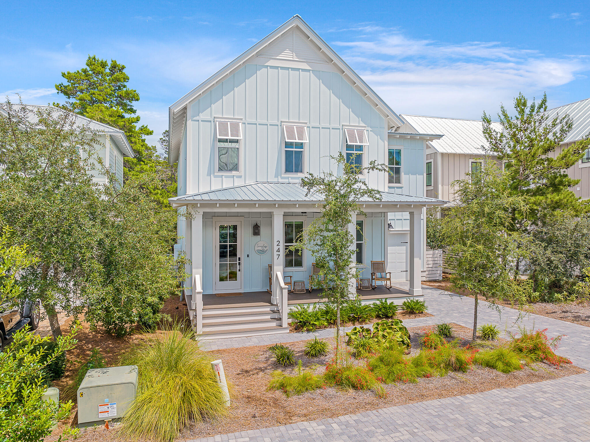 Experience coastal living at its finest in this beautifully built home located in the prestigious Lakeside at Blue Mountain Beach community. Being just a stone's throw away from the white sandy shores of Blue Mountain Beach, this exquisite 4-bedroom, 4.5-bathroom gem exudes coastal charm and modern luxury. Upon entering, be captivated by the seamless blend of elegance and comfort. The airy and light-filled living spaces boast a coastal-inspired decor, creating an inviting ambiance that complements the beachside setting of this home. Notably, this home comes fully furnished, enhancing its appeal and added convenience for those seeking a move-in ready abode or considering an investment venture. The amazing kitchen hosts a large island covered with natural quartzite. The Cafe appliances and