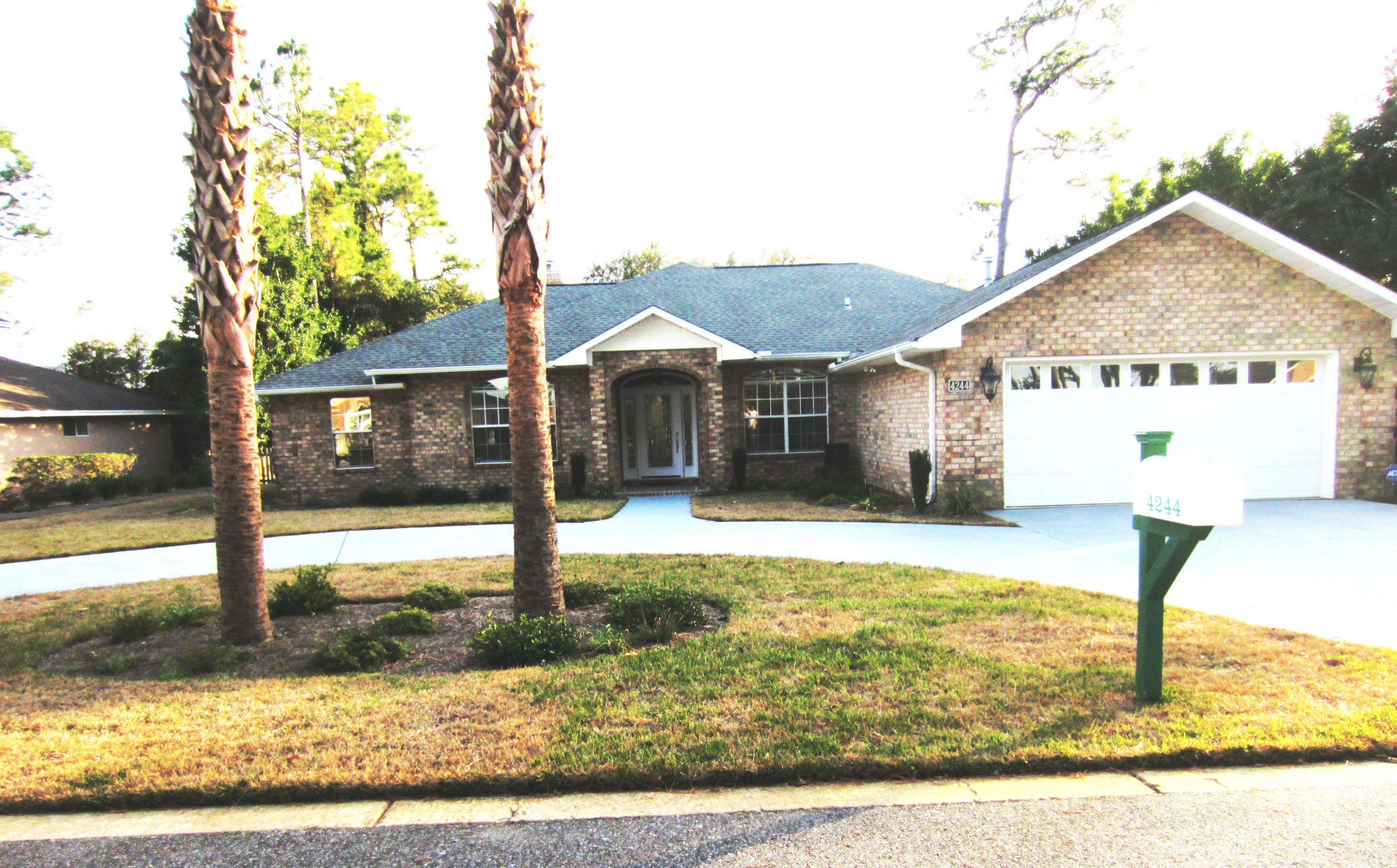 Looking for a truly ''MOVE-IN READY'' totally upgraded home? This exceptional brick 4-bedroom beauty is waiting for you! Freshly painted throughout, it features an open floor plan with 18'' tile floors and hardwood (carpeting in bedrooms), gas fireplace in living room, all new light fixtures and ceiling fans, and new Energy Star front and rear doors. The open kitchen has stainless appliances, granite countertops, solid wood custom cabinets, tumbled stone backsplash, and large pantry. Master suite has luxury bath with whirlpool tub, newly remodeled separate shower, and huge walk-in closet. Sellers have re-landscaped entire front lawn, added a circular drive and have recently added a pavered patio in back yard. The A/C was replaced in 2010 and new roof in 2012. Termite bond in place.