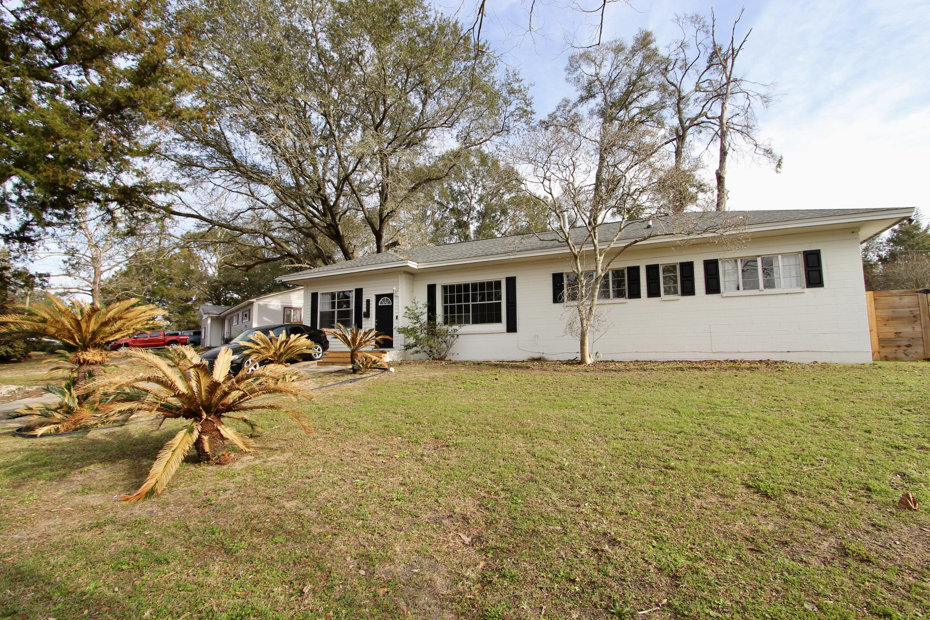 Beautiful corner lot filled with beautiful palms and fruit trees. Home was completely remodeled and boost NEW ROOF, NEW AC, NEW KITCHEN W/ QUARTZ COUNTERTOPS. Home includes LVP flooring throughout and NEW LED lighting and fixtures. Home ready for its new owner.