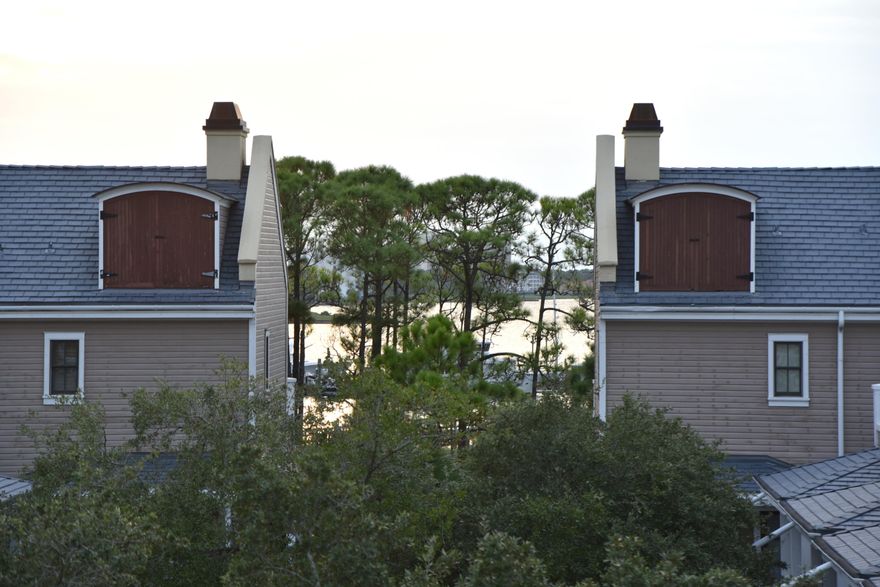 Watch the sunset on the Bay from this  condo's extensive veranda that also overlooks Baytowne Wharf in Sandestin Resort. This pristine coastal 2 bedroom, 2 bath, 4th floor retreat at Market Street Inn is well designed and sleeps 8 comfortably. As a retreat, it is a perfect primary residence or a secondary home.  As a turn key investment, these two units can be rented as two seperate lockout units or as a two bedroom with adjoining doors.  The character of these common living area units features a kitchen with appliances and a  washer/dryer in the primary condo and a kitchenette in the lockout condo. The Master's relaxing retreat offers a plush king size bed and an En Suite Bath with a large shower and a soaking tub. The spacious lockout condo offers 2 restful beds and a luxury full bath. Upgrades and Updates to the units include New mattresses in both 444 and 446 on 1/2022, a New Heat in Air in Unit 444 on 6/2022, (the A/C unit in 446 was installed in 5/2011), a Water Filtration system Kitchen sink cold water on 8/2023, a New Smart TV in unit 444 Living Room on 8/23, a New Kitchen Faucet on 9/23, New LED Can lights throughout 444/446 on 10/2023, a New Faucet and Sink in Bathroom 446 on 4/2024, and a New Dining Area light fixture and a New Ceiling Fan in the Living Area on 10/2024.
There is an Owners Storage Cage on the second floor of the parking garage for units 444/446.

Other amenities include a nice size pool, hot tub, wading pool, grilling area, fitness room +more. Owners have access to Founder's Club overlooking Baytowne Wharf event's plaza. Sandestin?? offers white sand beaches, 4 championship golf courses, tennis, pickleball, marina, casual & fine dining options, spas, shopping, constant live entertainment. 
