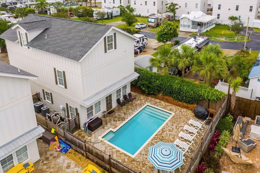 Completed in January 2018 and boasting a projected $140,000+ in gross annual rental revenue, 47 Sundance Court is an ideal vacation rental property. Upon walking in the front door, you are greeted with soaring 10' ceilings and a spacious open floor plan that provides a functional and carefully designed layout. The main floor is generous in space and flows seamlessly between the well appointed kitchen complete with a large island and additional sitting, living room, dining area and opens up to the pool area. The first floor has a spacious master suite with a walk-in closet, dual vanities and a walk-in shower. The egress to the pool and backyard provides an easy transition from indoor living to outdoor relaxation and the backyard boasts a large private pool surrounded by lush foliage, new pool furniture and ample privacy. 

This home functions very well as both a family home and a vacation rental property, as it was designed with care and attention and that shows in the details of the home. The entire property is finished with gorgeous hardwood flooring throughout, and the second and third floor bedrooms are thoughtfully designed to have king-sized beds, en-suite bathrooms and large closets. Additionally, the cobble-stone pavers surrounding the pool and making up the driveway provide an extra layer of elegance along with the soaring ceilings, tons of natural light and impeccable crown molding throughout.  

47 Sundance Court is centrally located near world-class shopping, dining, and entertainment such as the Destin Commons, Sandestin Outlets, and Grand Boulevard. This home also has a low HOA fee of only $500 annually and is only a short walk from public beach access.