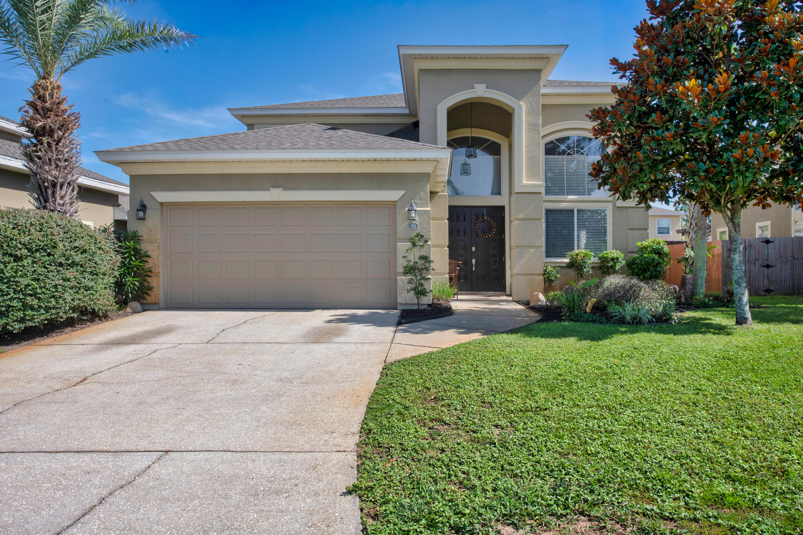 Welcome to your Mediterranean dream home--where grand meets cozy and convenience meets style!Tucked away in the beautiful community of Solimar, this spacious 5-bedroom, 2.5-bathroom home offers the perfect blend of elegance and everyday comfort. Just minutes from Hurlburt Field, yet nestled in a quiet and private corner of Mary Esther, you'll feel worlds away without sacrificing location.Step inside to soaring 20-foot ceilings, freshly painted Milano cabinets, and stunning built-in bookcases that add charm and functionality to the airy living room. The large dining area is ideal for entertaining and includes sleek butler's cabinets for extra storage and serving space.On the main level, the owner's suite is your own private retreat, complete with two walk-in custom closets, a soaking tub, and an oversized walk-in shower that'll make every day feel like spa day.
Upstairs, you'll find four more spacious bedrooms, perfect for family, guests, or a home office or two. Outside, your gunite pool with water feature brings the vacation vibes home, just add sunscreen and your favorite float. (Buyer to verify any information that is important to them).
