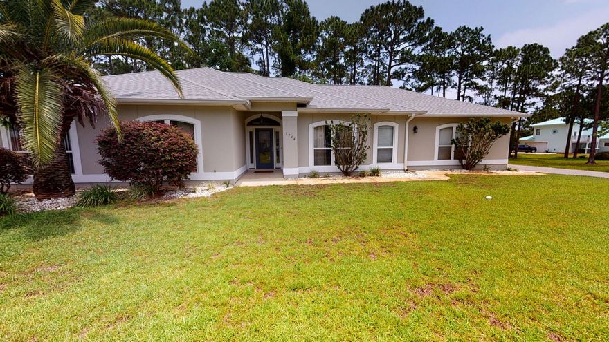 BACK ON THE MARKET WITH NO FAULT OF THE SELLERS. Don't miss your opportunity to make this one Home!  This updated and immaculate Gem is located in a Water Front community that boasts Deeded water access, fishing pier, launch for small craft, club house, tennis court, community pool, and underground utilities.  Exquisite 4 bedroom/2.5 bath home  features a high trey ceiling in the family room, fireplace and tile floors.  Functional eat-in kitchen with hop up breakfast bar and stainless appliances.  Huge Master bedroom with two large walk-in closets, dual sink vanity, garden tub and separate shower.  Enjoy the private backyard from the screened in patio.  Updates include a new roof and water heater 2022, freshly painted inside and out, new carpet in the bedrooms and new exterior lights.