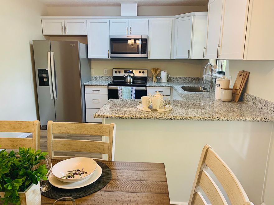 Come see this newly renovated 3BR/2BA, 1-story home in West Milton! You do not want to miss this lovely property on over 1/3 acres. Surrounded by oak trees, you will love this home which features all new Shaker-style kitchen cabinets with crown molding, granite countertops, and stainless steel appliances. Both baths have been tastefully upgraded with new vanities, mirrors, lighting, and plumbing fixtures. The living area opens to both the kitchen and dining area, making this home great for entertaining family and friends.