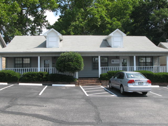 Nice office space with several offices, 2 large rooms, and two restrooms. Tenant occupied. Available around January 1st.