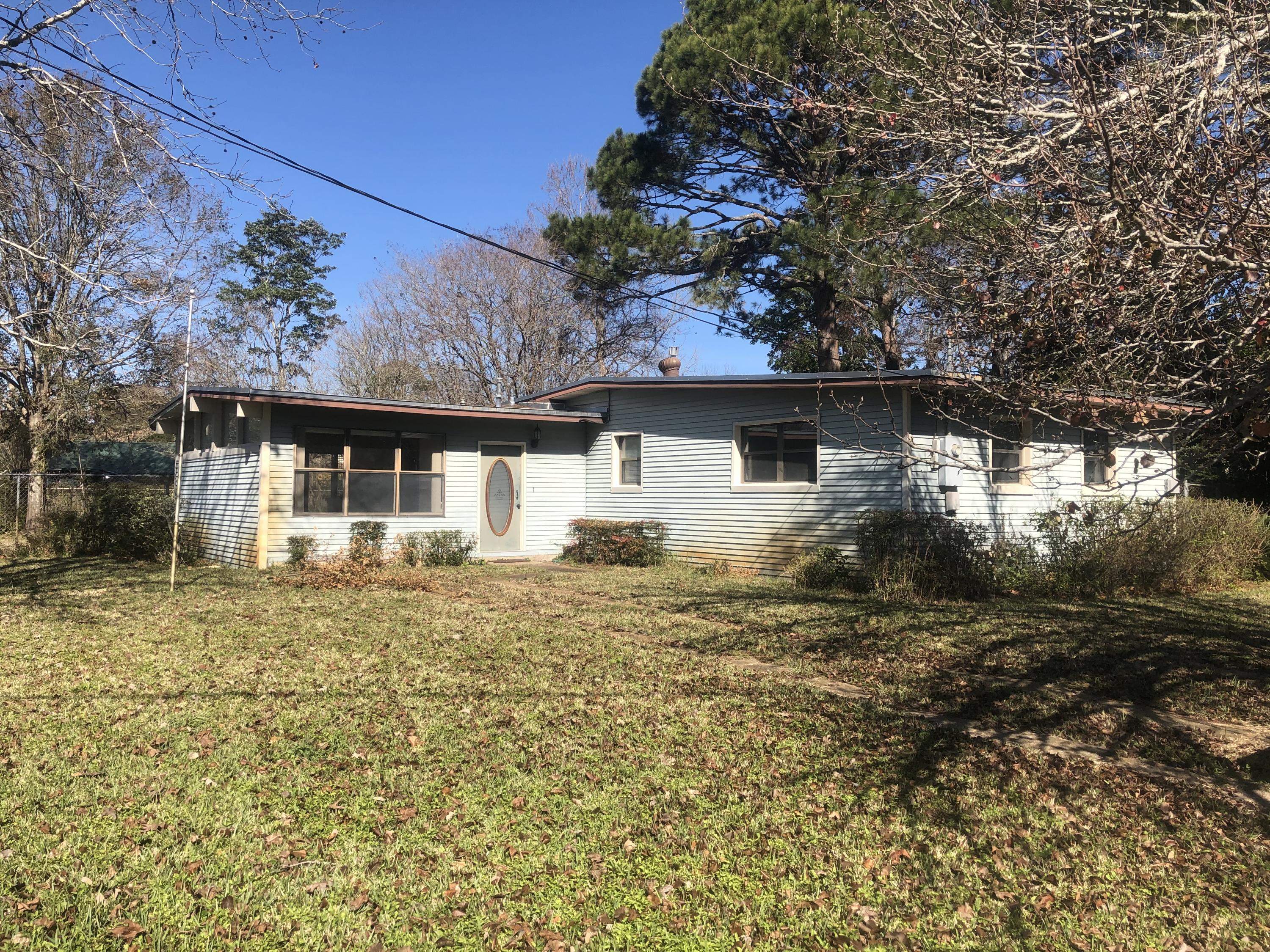 Calling all investors and flippers!!! Charming fixer-upper located on a GORGEOUS corner lot in a nice, quiet neighborhood. The home has great bones and has been completely gutted. The owners were planning to remodel but just don't have the time. Beautiful fenced in backyard with storage shed. This home needs extensive work and will NOT qualify for all financing. However, with some work, this would make a great family home, very close to everything Fort Walton Beach has to offer. Home is being sold AS-IS. Don't let this great investment pass you by.
