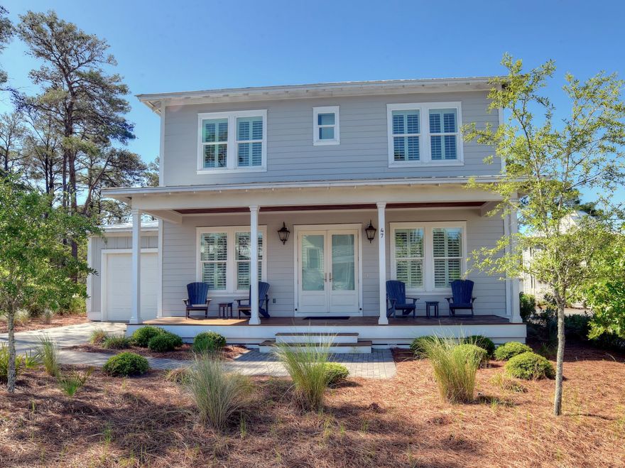 Lovely coastal cottage on corner lot in beautiful quiet Blue Mountain Beach. This home is in gated Lakeside Development with community pool and gathering center and is within walking distance to the beach. All upgraded tile, lighting, stainless appliances and genuine hardwood floors throughout. Granite countertops in kitchen with tile backsplash. 10 foot ceilings throughout and plantation shutters at all windows. This four bedroom three full bath home is perfect for rental, family gatherings or second home. The home is not on a rental program. Paved patio with outdoor grill, one car garage. It has a bedroom and full bath on the main floor. Great restaurants and shopping venues are close by and the famed WaterColor and Seaside Developments are only a few miles away.