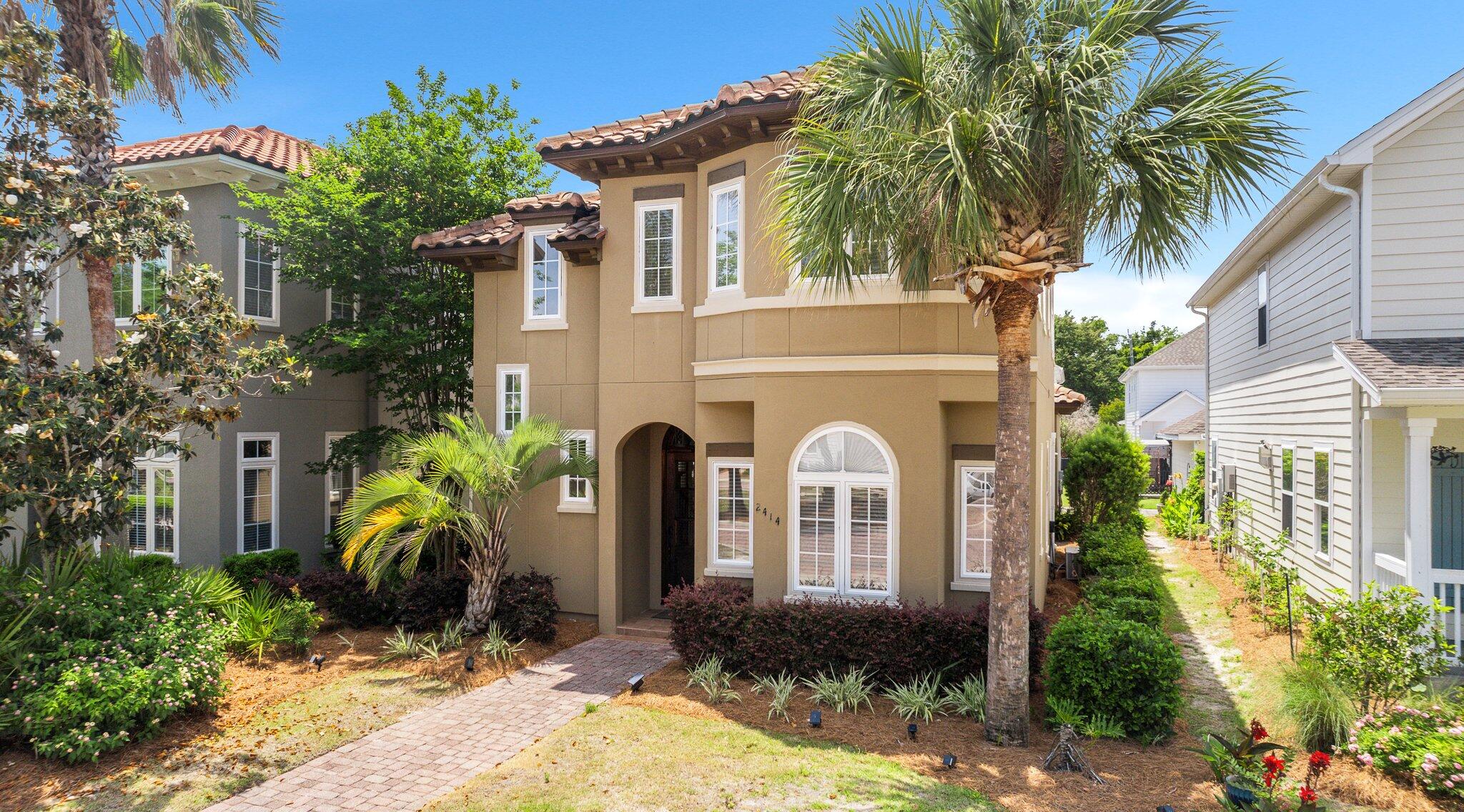 An inviting custom built home by John Willis Homes is nestled within the esteemed gated bayfront community of Magnolia Bay Club. This charming 4-bedroom home exudes Tuscan-inspired elegance, offering 1,812 square feet of comfortable living space, a 2-car garage, and upscale finishes throughout, including travertine tile, crown moulding, a paver driveway, and more. A new tile roof was installed in 2019, a new HVAC in 2019, and as a bonus the home is offered furnished. Convenience meets luxury with this prime location, providing easy access to shopping, dining, the pristine white sandy beaches, and a plethora of community activities. Step inside to discover the heart of the home including a gas stove and wine cooler. The breakfast bar invites casual dining and effortless entertaining.
The home boasts two master suites, providing flexibility and privacy for residents and guests alike. The first-floor master offers convenience, while the second-floor retreat promises elevated views and tranquility. The master bathroom is a true oasis, featuring dual vanities, a tiled walk-in shower, and a luxurious soaking tub - perfect for unwinding after a long day.
The dining area seamlessly flows onto the covered back porch, creating an ideal space for outdoor gatherings and al fresco dining. Additional bedrooms ensure ample accommodation options for family and visitors, while the gated community offers a wealth of amenities to enhance your lifestyle.
Indulge in the resort-style amenities, including a bayfront swimming pool, dining pavilion, gas grills, clubhouse with a fitness center, TV lounge, and billiards/ping pong. Children will enjoy the playground, while outdoor enthusiasts can explore the community dock and private beach with complimentary kayaks for owners. Lawn maintenance, irrigation, are included to ensure low maintenance.
Experience the epitome of coastal living at 2414 Grandiflora Boulevard - where luxury meets convenience in a vibrant waterfront community. Don't miss your chance to make this idyllic retreat your own. Schedule a private tour today!