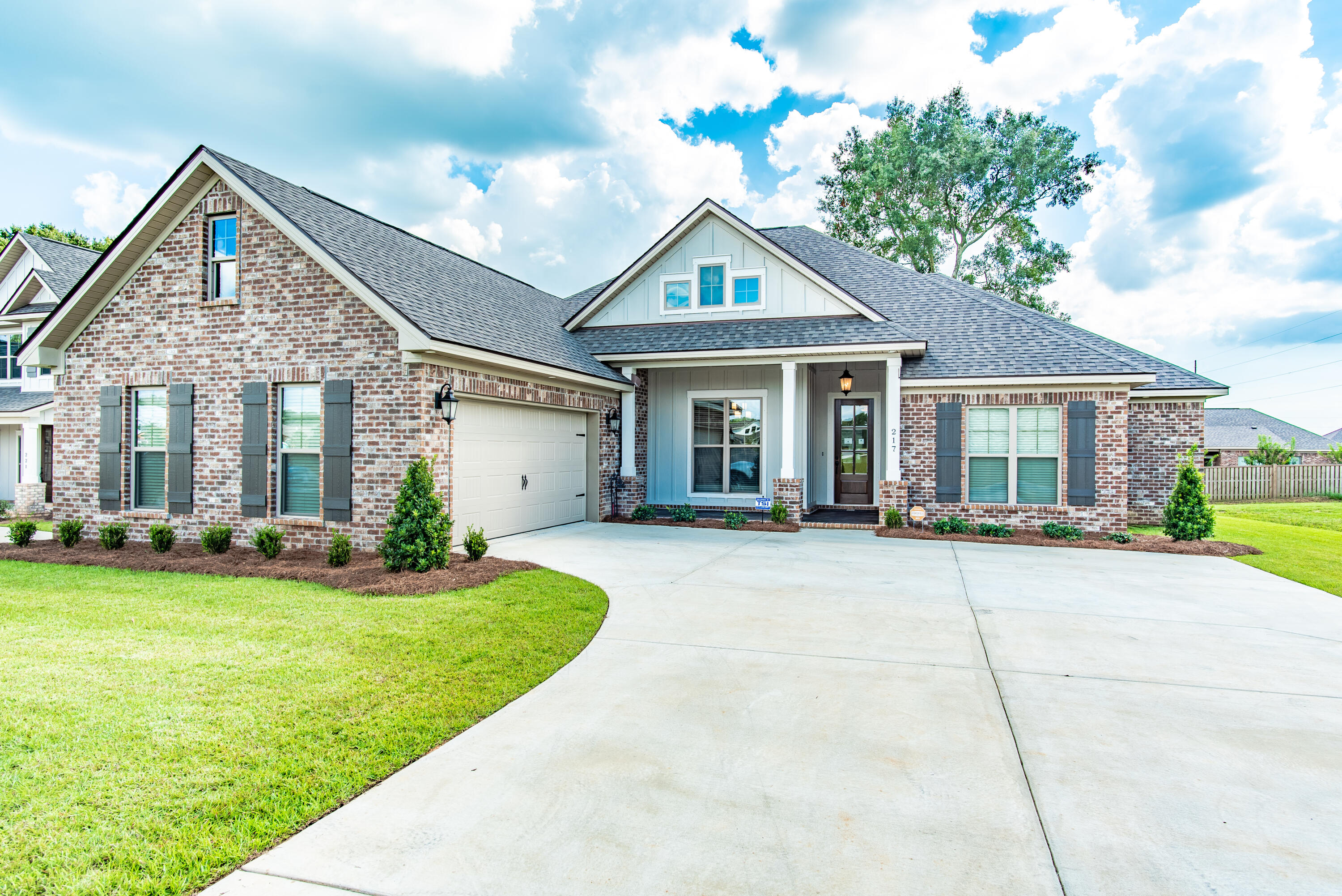 Our Florence plan is conveniently located at the front of Buxton's Mill, on about 0.37 of an acre. The 8' mahogany front door invites you into 2609 sqft of a large open floorplan comprised of the family room, dining room, split level gourmet kitchen and breakfast nook and a flex space just off the kitchen, making it perfect for entertaining guests or just relaxing with the family! The primary bedroom and bedroom 4 are located just off the family room. The primary bedroom features a tray ceiling and on-suite bath complete with double vanity, garden tub, separate shower and spacious his/hers closets. Bedrooms 2-3 are located on the opposite side of the home with a jack-n-jill bath in between. This particular home boasts gas drop on back porch, laundry sink in third car garage, pure white shaker style cabinets in kitchen/baths, Fantasy Brown granite countertops, enhanced vinyl plank throughout main living areas and primary bedroom, carpet in secondary bedrooms, tiled baths, frameless primary shower door, 3-piece trim and painted brick fireplace.
*Pictures are from a different home so finishes/upgrades will vary but floorplan is the same. To be completed July 2023.