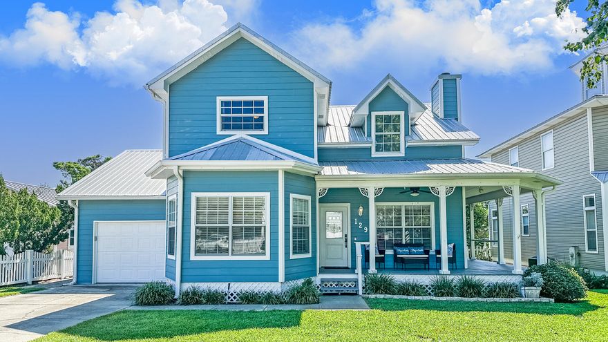 Welcome home to this beautiful 2 Story house that LOOKS and feels newer because of all the updates. Home is located on the quiet Bid a Wee Lane ,in the coveted PCB beach community with a short walk to Bid-a- Wee Dedicated Beach with Private Locked Access Gates . With 4 Bedrooms and 3 Full Baths make this a perfect Family Home, Primary Home or Second Home .The Kitchen has been updated with stainless appliances, tile backsplash ,nice pantry and kitchen island for all your prep work.2 new doors off the kitchen that really bring in natural light . Upstairs ( check out the stairs and wallpaper and custom woodwork) you will find a Master Bedroom with 2 walk-in master closets and an ensuite bathroom remodeled with soaker tub and tiled shower. The Guest Bedroom upstairs is also an ensuite with a with a updated bathroom, walk-in closet and nook storage area. Head back downstairs to the Big Family Room that is perfect for all your entertaining and includes a working Fireplace equipped with electric logs/heater for those cool nights .Adjacent Big Bedroom that is currently being used as an office and work out room is a must see for it's multi-use possibilities .This space includes new frosted glass doors added to the spacious closet. 4th Bedroom with Full Bath and washer/dryer are conveniently located off the kitchen. Other key features of this ideal family dream home include : all closets are freshly painted; wood floors in Family Room ; LVP in all bedrooms; tile in baths ,kitchen and dining area ; hardi- plank siding; metal roof ;wrap- around front/side porch(freshly painted );all electric; patio out back ;large back yard for kids/pets with space to add a pool if desired ;and an oversized garage with storage room .