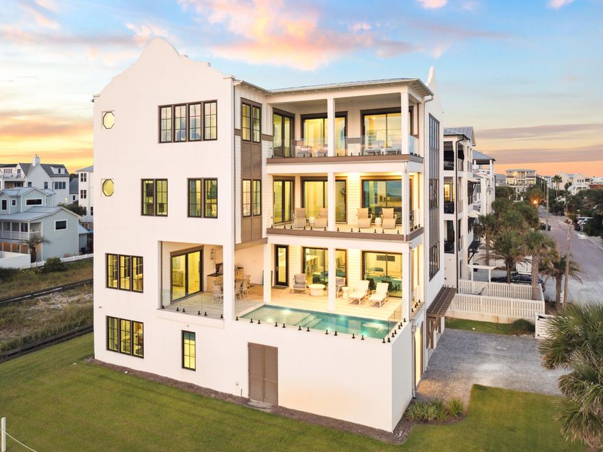 Nestled in an idyllic location overlooking protected dunes with stunning forever Gulf views, 91 Emerald Cove Lane presents an unparalleled opportunity for luxury living. Thoughtfully positioned on a prime corner lot in Inlet Beach, this residence ensures unobstructed vistas of the Gulf from every level, with sweeping views enjoyed from all living spaces. Spanning more than 7,600 square feet across four levels, the home is designed for both grand entertaining and private retreats. A welcoming foyer introduces the main level, featuring a spacious primary suite, a billiard and game room, and a private owner's lockout. The second floor serves as the heart of the home, where expansive living and dining areas flow seamlessly to a resort-style pool terrace. A gourmet kitchen with crisp white cabinetry, a statement island, state-of-the-art appliances, and custom lighting anchors the space, while a full laundry room adds convenience.

Guest accommodations are abundant, including a private guest suite with en-suite bath, a custom bunk room with its own bathroom, and another guest suite overlooking the dunes. A secondary living and game area with shuffleboard completes the third floor. The top level is dedicated to two remarkable primary suites, each capturing panoramic Gulf views with en-suite baths and walk-in closets. One retreat features a spa-inspired bath with a soaking tub perfectly positioned to take in the breathtaking scenery.


With six bedrooms, six and a half baths, covered balconies on every floor, and refined details such as crown molding and wood flooring throughout, this home blends modern luxury with timeless coastal beauty. Just steps from the beach walkover and moments from 30A's best dining, boutique shopping, and entertainment, 91 Emerald Cove Lane defines the pinnacle of Gulf-front living.