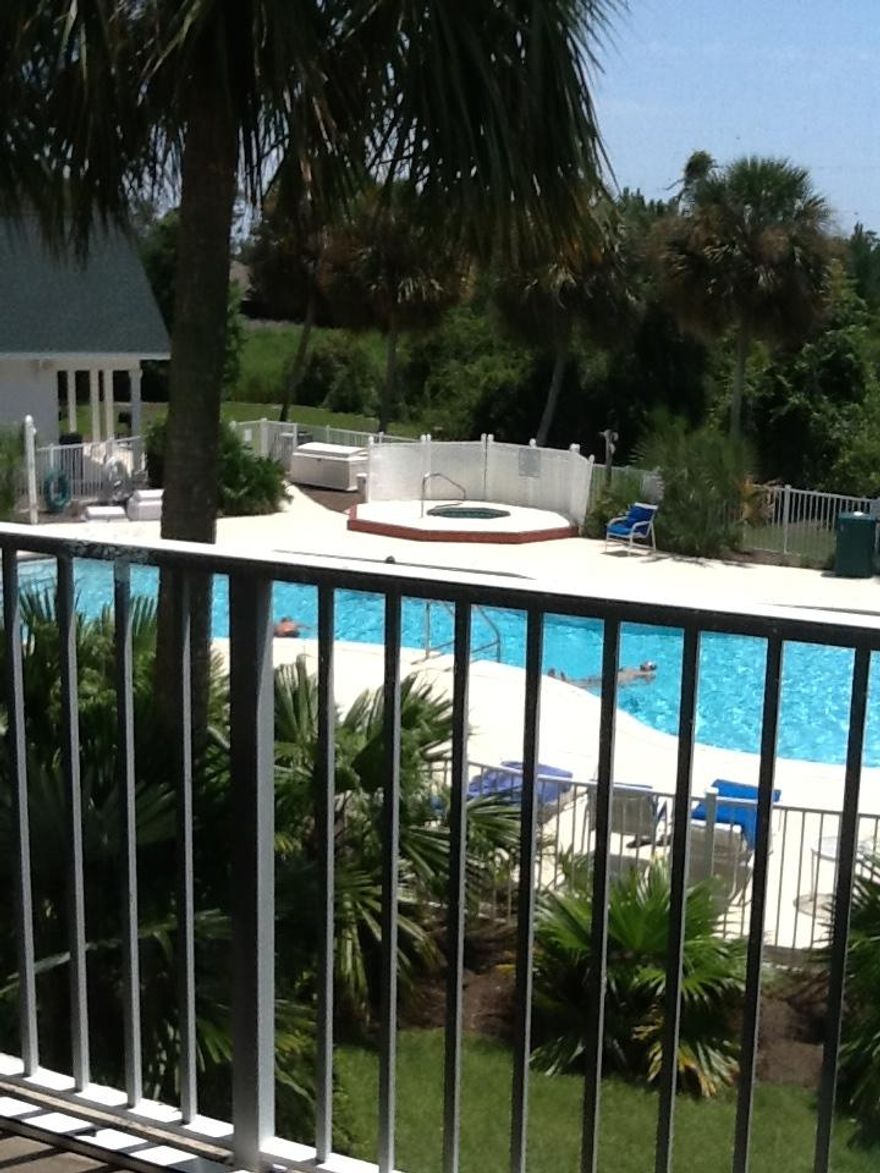 This well kept unfurnished Culebra Plan @ Florida Club overlooking the pool & hot tub, features plank & tile floors throughout. Both bedrooms feature walk in closets. Condo comes with refrigerator, stove, full sized washer & dryer. Storage room on outside screened balcony. Florida Club boasts a pool, hot tub, sauna & work out room for your use. The community room, complete with fireplace, can be rented for your private use. This unit is currently on my rental program. Sold 'as is' with right to inspect. Subject to lender short sale approval.