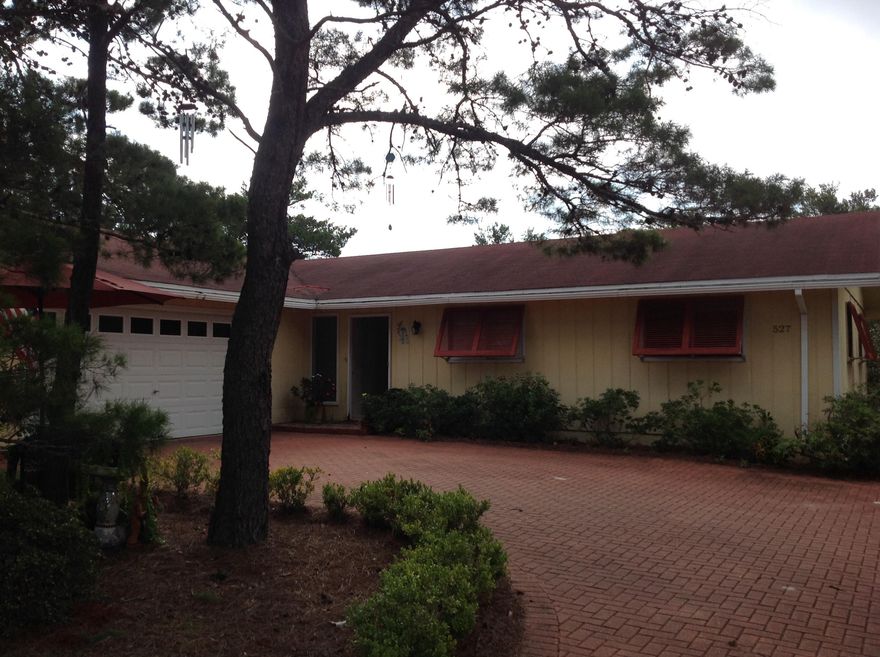 FIXER UPPER on large site in Santa Rosa Ridge. Conveniently located on low-traffic Ridge Road, near Golf course, area shopping, dining and with direct beach access via County Hwy 393 south to Ed Walline Park. Offered 'AS-IS', with right to inspect.