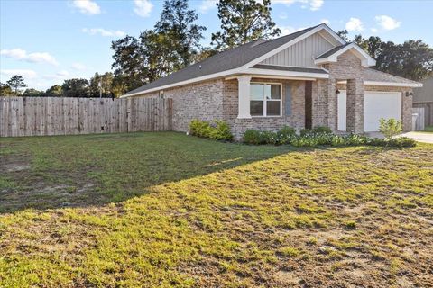 Photo of 5150 Gaineswood Drive, Milton, FL 32583 (MLS # 988086) Photo of 5150 Gaineswood Drive, Milton, FL 32583 (MLS # 988086)