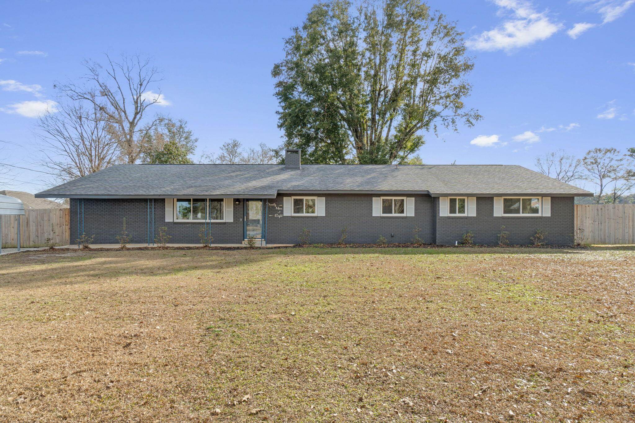 Welcome to 2948 Barton Road, this charming 5 bedroom, 2 bath ranch-style home with a separate guest entrance and living room features plenty of space and options. Built in 1968, this 2,614 sqft home has been thoughtfully updated with no expenses spared. Some of the updates include New Tile Floor and Baseboards throughout, New Exterior Windows & Sliding Glass Door, some New Interior Doors, New Ceiling Fans and Light Fixtures, and New Interior and Exterior Paint. The kitchen serves as the heart of the home, featuring sleek granite countertops, soft-close cabinets, stainless steel appliances, and cabinet space galore! Perfect for creating meals and memories alike.The living room and dining room outside of the kitchen offer plenty of space to sprawl out and entertain by the fireplace. The Windows and Sliding glass door on both sides let in plenty of natural light. 
All of the bedrooms are generously sized and the house features plenty of storage space. The home also offers a guest-side entrance with an additional living room and bedroom that are connected to the main house. This leaves the possibility for a guest suite, office, or anything you desire. 
Situated on a 0.75-acre lot with a fully fenced privacy back yard leaves plenty of room for entertainment without being too close to your nearest neighbor. The extended driveway and covering allow plenty of room to park a boat or RV with room left over. 
This is the home with all of the updated features you have been looking for. 
