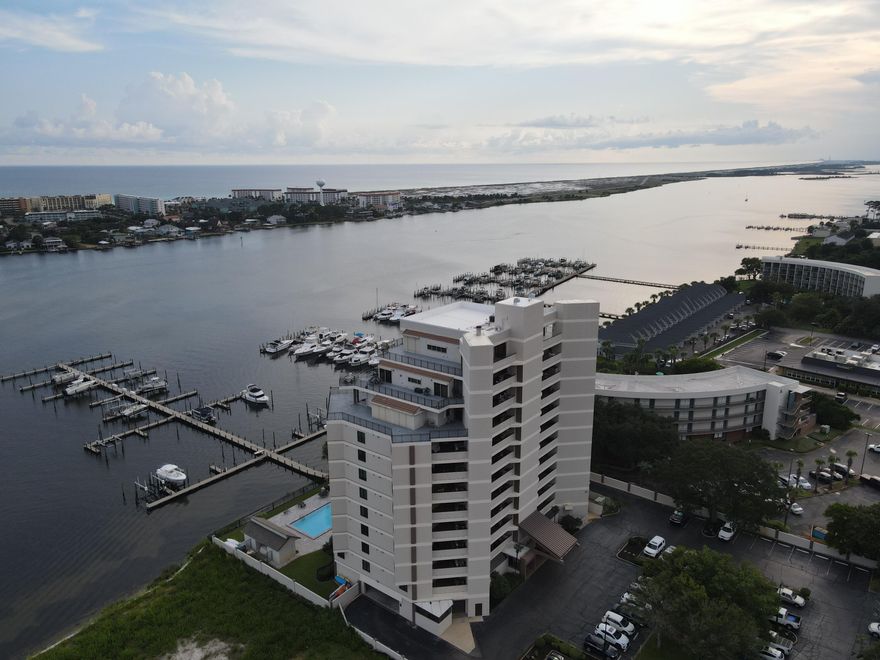 Welcome to 200 West, where waterfront living meets effortless style. Perched on the 6th floor, this spacious 2BR/2BA condo offers panoramic views of the Santa Rosa Sound and unforgettable sunsets right from your private balcony. Here, life is about more than square footage -- it's about stepping downstairs to your deeded dock,, enjoying calm waters perfect for weekend cruises, and coming home to a community that values peace, security, and connection.Inside, you'll find an open-concept living space with floor-to-ceiling glass that frames the water, a modern kitchen with stainless appliances, and a primary suite that makes every morning feel like a retreat. The building is pet-friendly (25 lb limit), secure, and designed for low-maintenance living -- perfect whether you're seeking a full-time residence or a lock-and-leave second home.

Skip the marina waitlists, skip the Gulf-front crowds, and discover why soundfront living is the Emerald Coast's best-kept secret. 200 West combines convenience, comfort, and a lifestyle you'll love.