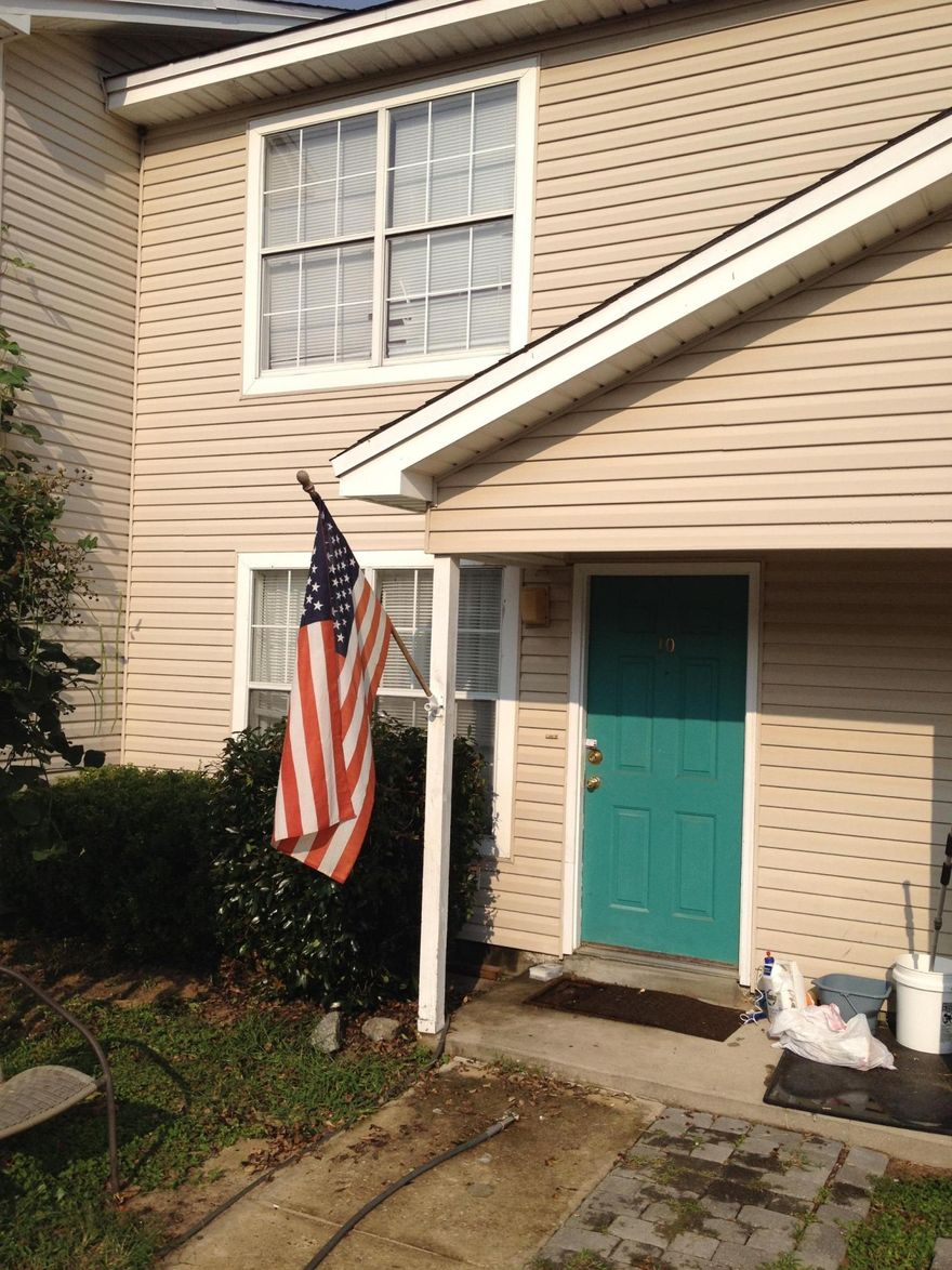 Tucked away in a quiet neighborhood, this unit offers a 2 bedroom floor plan with 1 full bath on the second floor plus a half bath on the first floor to service the living area. This townhome offers a spacious kitchen with 2 pantry's, washer and dryer hookups and a sliding glass door off of the kitchen that leads to a fenced backyard. New Roof was put on in 2004. All appliances convey and this property comes with a 1 year limited home warranty furnished by the Seller. Nice trees and plenty of parking. This property is centrally located between both Military bases, several shopping centers and a short trip to the beaches. Seller is highly motivated and would like to close in this tax year.