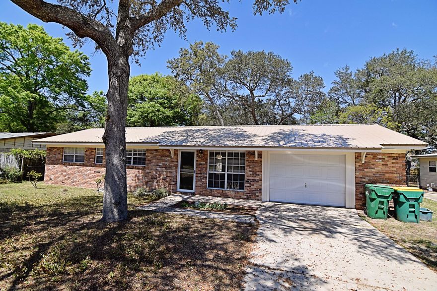 This all brick home has 2 bedrooms and 2 full baths. Enjoy the fully fenced back yard from your brand new deck just off the tiled florida room. The many trees provide tons of shade even in the heat of the day. There's a large shed for your latest hobby storage too. Parquet wood throughout. Kitchen has all the appliances you'll need to get cooking, and a washer and dryer for easy clean up. Located in the heart of Niceville on a quiet street with older homes, this is a must see. Owner will consider a pet that is spayed or neutered and fully housebroken with a yearly non refundable $250 pet fee and a one time $250 refundable pet deposit.